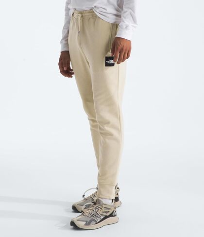 THE NORTH FACE Men's Core Jogger, TNF Medium Grey Heather/TNF Black, Large Regular in Saudi Arabia