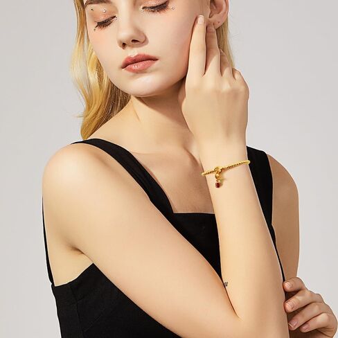 Free bird Cross Birthstone Bracelet | Dainty 14K Gold Plated Cross Charm Bracelet for Women | Stretchable Elastic Gold Beaded Bracelet | Stackable Trendy Birthstone Bracelet | Jewelry Gifts for Women in Saudi Arabia