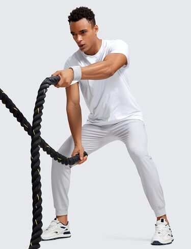 CRZ YOGA Athletic Joggers for Men 29"/31" Lightweight Water Resistant Outdoor Workout Pants with Zip Pockets in Kuwait