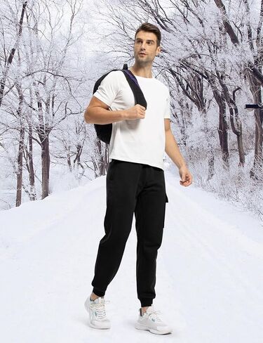 TBMPOY Mens Cargo Sweatpants Joggers Winter Fleece Lined Pants Gym Running Cotton Pants with Zipper Pockets in Kuwait