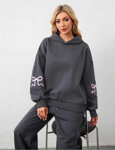 MISSACTIVER Women Oversized Bow Print Hooded Sweatshirt Fleece Long Sleeve Drop Shoulder Graphic Pullover Hoodie Tops in Saudi Arabia