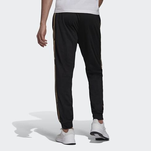adidas Men's Warm-up Tricot Tapered Camo Track Pant in Saudi Arabia