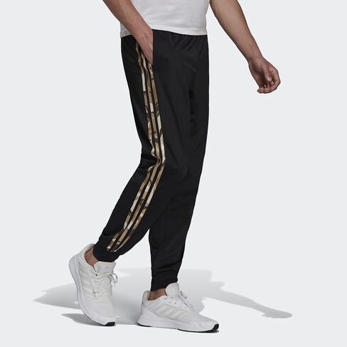 adidas Men's Warm-up Tricot Tapered Camo Track Pant in Saudi Arabia
