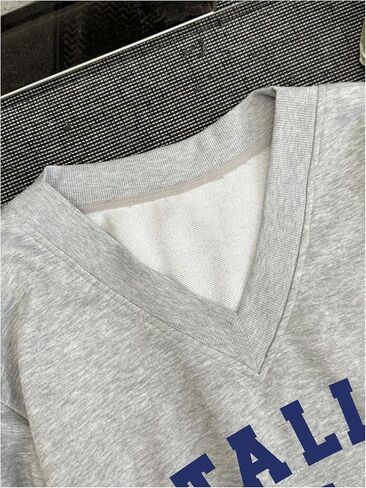 WDIRARA Women's V Neck Letter Graphic Oversized Sweatshirt Long Sleeve Drop Shoulder Pullover Top in Saudi Arabia
