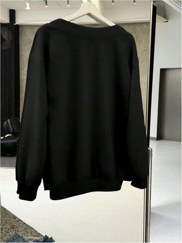 WDIRARA Women's V Neck Letter Graphic Oversized Sweatshirt Long Sleeve Drop Shoulder Pullover Top in Saudi Arabia
