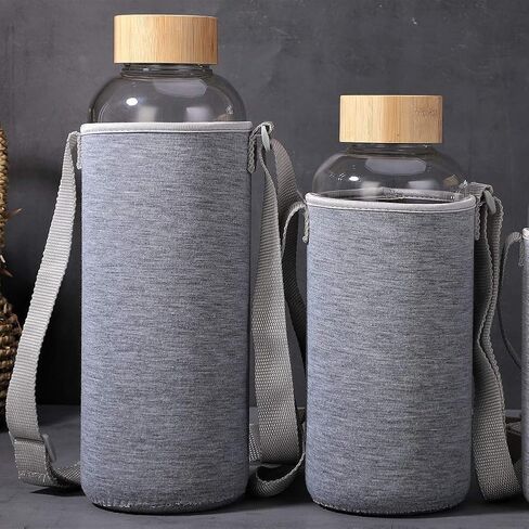 زجاجة ماء زجاجي من الزجاج 64 أوقية مصب عريض مع غطاء خيزر in Kuwait