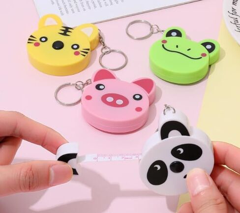 أشرطة قياس قابلة للسحب من البلاستيك الخنزير الأشرطة الكرتونية لقياس الأشرطة مع المفاتيح للقطعة من أدوات قياس خياطة الخياطة ، ومقاييس شريط الخياطة ، ومقاييس الشريط والحكام (3H034) in Kuwait