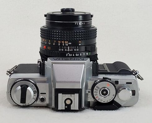 Minolta XG-M Manual Focus 35MM SLR Film Camera with Minolta MD mount Manual Focusing Zoom lens. Compatible with color and B&W film manual & auto shutter options (Renewed) in Saudi Arabia