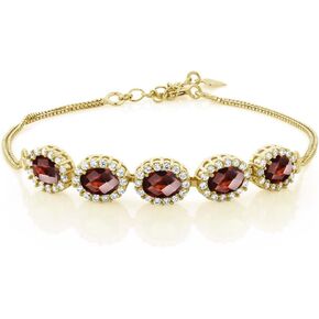 Gem Stone King 18K Yellow Gold Plated Silver London Blue Topaz Tennis Bracelet For Women (5.54 Cttw, Gemstone Birthstone, Oval 7X5MM, 7 Inch + 1.5 Inch Extender)