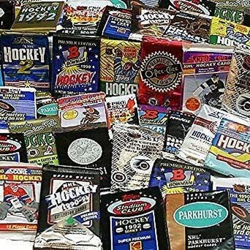 مجموعة 300 بطاقة هوكي غير مفتوحة في عبوات مختومة من المصنع من بطاقات هوكي NHL القديمة من أواخر الثمانينيات وأوائل التسعينيات. ابحث عن قاعة المشاهير مثل واين جريتسكي وماريو ليميو وجارومير جاجر. in Saudi Arabia