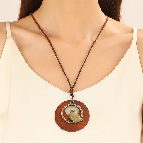 WCRAZYE Leather Cord Necklace for Women Handmade Boho Choker Necklace Long Bird Leather Pendant Bohemian Sweater Chain Neckalce Vintage Alloy Pendant Leather Rope Necklace Wooden Necklaces in Saudi Arabia