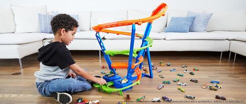 Hot Wheels Toy Car Track Set Spiral Speed Crash, Powered by Motorized Booster, 29-in Tall Track with 1:64 Scale Car, Connects to Other Tracks in Saudi Arabia