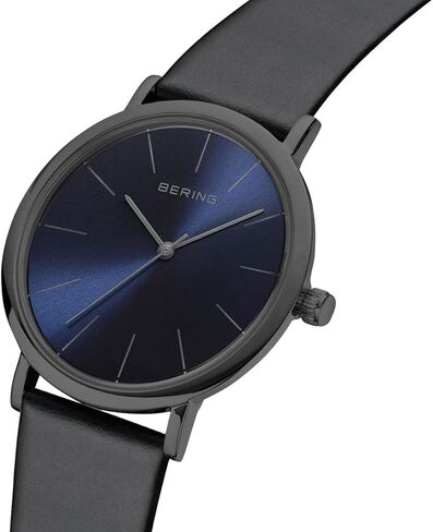 ساعة BERING التناظرية الكوارتز الكلاسيكية للنساء مع حزام جلد العجل وكريستال الياقوت الأزرق in Kuwait