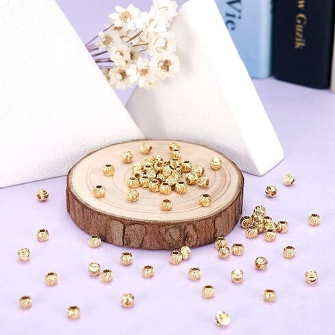 Craftdady 100pcs 18K Gold Corrugated Round Spacer Beads 4mm Tiny Brass Rondelle Ball Loose Beads for Jewelry Making Hole: 1mm in Saudi Arabia
