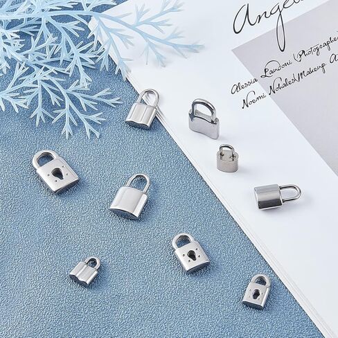 SUNNYCLUE 1 Box 9 Styles Silver Lock Charms Stainless Steel Padlock Pendants Mini Hollow Key Hole Lock Metal Charm for Valentine's Day Gifts Necklaces Earrings DIY Crafts Making Supplies in Saudi Arabia