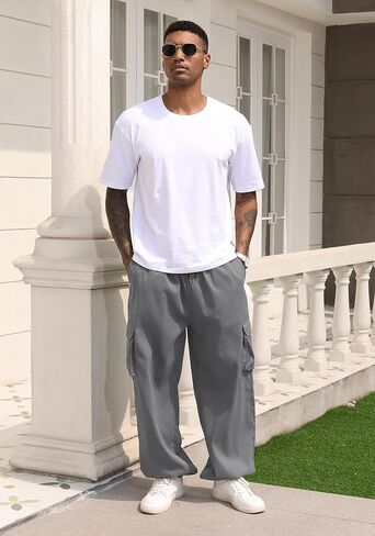 السراويل البضائع الرجالية المشي لمسافات طويلة Sweatpants ركض الهيب هوب فضفاض الحريم العمل رياضي فضفاض صالح في الهواء الطلق بنطلون مع جيوب in Kuwait