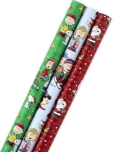 Hallmark Christmas Peanuts Wrapping Paper with Cut Lines on Reverse (Pack of 3, 105 sq. ft. ttl) Snoopy, Charlie Brown, Woodstock (5JXW1036) in Saudi Arabia
