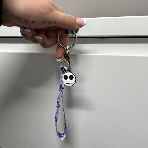 Disney PRINTED NIGHTMARE BEFORE CHRISTMAS WRIST LANYARD W/SILICONE CHARM- IMITATION RHODIUM 2PC SET in Saudi Arabia