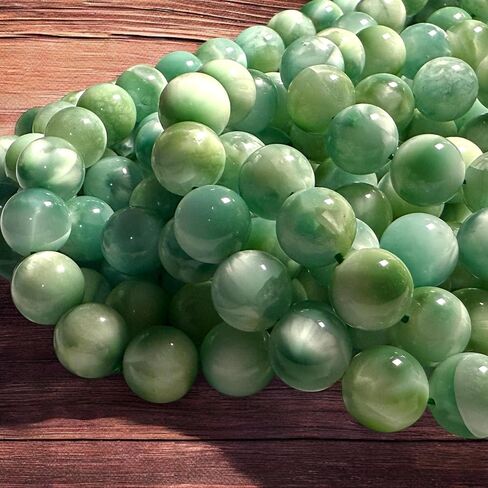 ABCGEMS Dominican Republic Larimar Beads with Black Iron Oxide Inclusion (These Hematite Inclusion Manifest as Black Streaks Providing a Striking Contrast) Smooth Round 12mm in Saudi Arabia