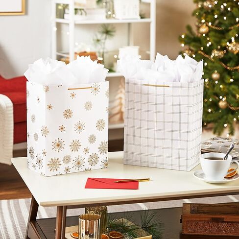 Hallmark 13" Christmas Gift Bags (4 Large White Bags: Gold Snowflakes, Gold Plaid) for Holiday Parties, Winter Weddings, Bridal Showers in Saudi Arabia