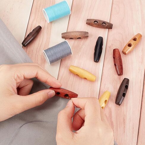 GORGECRAFT 70Pcs Oval Wooden Buttons Horn Toggle Shape Buttons Accessories 2 Holes Wood Sweater Coats Buttons for Jacket Clothing Sewing DIY Art Craft Projects, 7 Colors in Kuwait