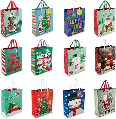 Christmas Gift Bags Medium Size Bulk-24 Charming Christmas Designs- Holiday Gift Bags with Colored Christmas Tissue Paper and Gift Tags-Christmas Goody Bags with Ribbon Handles -Foil Stamped Xmas Bags in Saudi Arabia