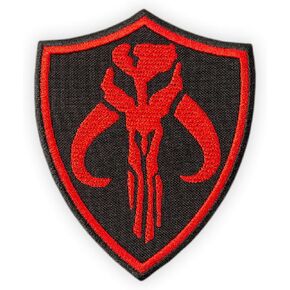 Mythosaur Skull Patch - Mandalorian Bounty Hunter Emblem on Shield - Star TV Series - Embroidered Iron On Applique Badge Patch - for Jackets, DIY and Backpacks - Size: 3.2 x 3.9 inches