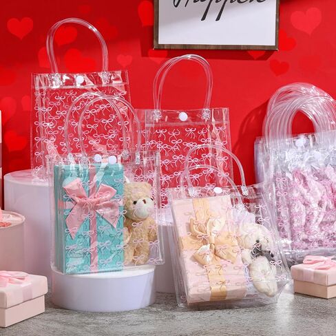 Sweetude 24 Pcs Coquette Bow Gift Bags Bow PVC Clear Gift Bag with Handle Goodie Candy Treat Bags for Birthday Baby Shower Bridal Shower Christmas Party Supplies in Kuwait