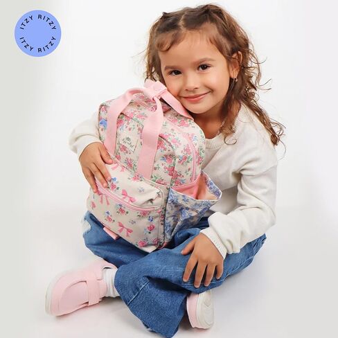 Itzy Ritzy Toddler Backpack - Daycare Bag - Features Adjustable Shoulder Straps, 2 Side Pockets & Spacious Interior with Wipeable Fabric Lining & Name Label, Ribbons & Roses Backpack in Kuwait