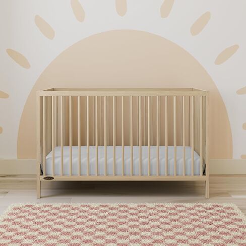 Graco Teddi 4-in-1 Convertible Mini Crib with Bonus Mattress, Driftwood | GREENGUARD Gold Certified, 2.75-Inch Water Resistant Mattress Included, Small Spaces Crib, Easy 30-Minute Assembly in Saudi Arabia