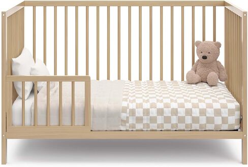 Graco Teddi 4-in-1 Convertible Mini Crib with Bonus Mattress, Driftwood | GREENGUARD Gold Certified, 2.75-Inch Water Resistant Mattress Included, Small Spaces Crib, Easy 30-Minute Assembly in Saudi Arabia