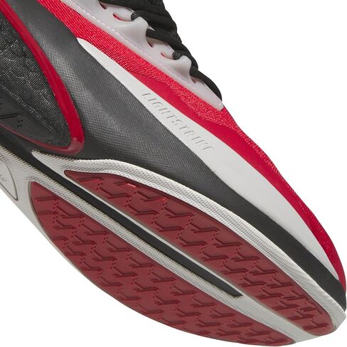 Adidas للجنسين-NCAA 25/26 Team Alphaboost V2 Sneaker in Saudi Arabia