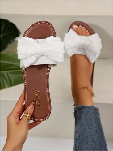 GORGLITTER Women's Bow Flat Sandals Open Toe Slip On Vacation Dressy Slide Sandals in Saudi Arabia