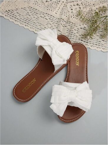 GORGLITTER Women's Bow Flat Sandals Open Toe Slip On Vacation Dressy Slide Sandals in Saudi Arabia