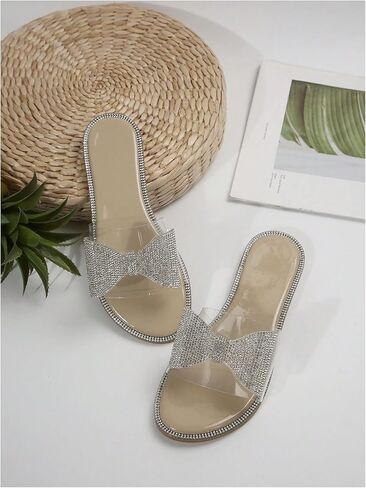 GORGLITTER Women's Rhinestone Bow Flat Clear Sandals Open Toe Slip on Summer Slide Sandals in Saudi Arabia