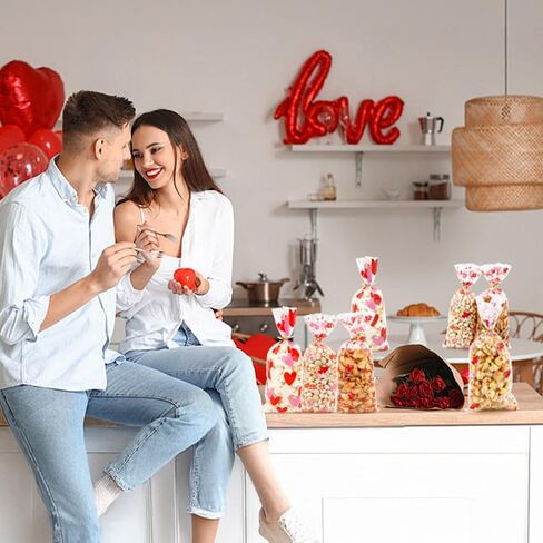 100Pcs Valentines Cellophane Treat Bags Red Love Goodie Bags with Twist Ties Heart Print Gift Bags Plastic Candy Bags Party Favors Bags for Valentine's Day Birthday Wedding Party Supplies in Saudi Arabia