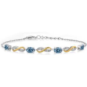 Gem Stone King 925 Sterling Silver and 10K Yellow Gold Oval Blue Sapphire and White Lab Grown Diamond Infinity Tennis Bracelet For Women (2.27 Cttw, Fully Adjustable Up to 7.5 Inch)
