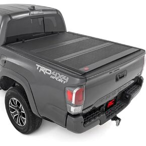 Rough Country Hard Low Profile Tri-Fold Truck Bed Tonneau Cover for Toyota Tacoma (2016-2023) - Fits 5' (60.5") Bed, Flush Aluminum Panels