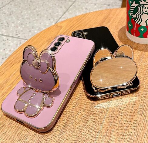 حافظة لهاتف سامسونج جالاكسي S24 الترا للنساء والفتيات، مسند مرآة على شكل أرنب مخفي لطيف، حافظة هاتف S24 الترا مطلية ببريق ناعم من البولي يوريثان اللدن بالحرارة، غطاء بناتي لهاتف سامسونج S24 الترا باللون الأسود in Kuwait