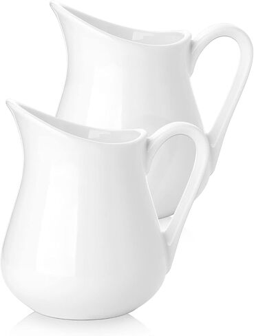Nucookery Ceramic 4 Oz Creamer Pitcher Set, 2 Pack Creamer Container, Small Milk Pitcher Container, White Creamer Cups with Handle For Sauces Salad Coffee Milk, Microwave & Freezer Safe, Set of 2 in Kuwait