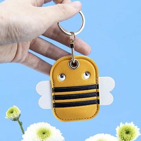 Airtag keychain حامل طيران لطيف ، سحر حقيبة جلدية متوافق مع سلسلة مفاتيح Apple Airtag Holder Airtag ، سلسلة مفاتيح GPS Airtag للحيوانات الأليفة ، الأمتعة (الليمون) in Kuwait