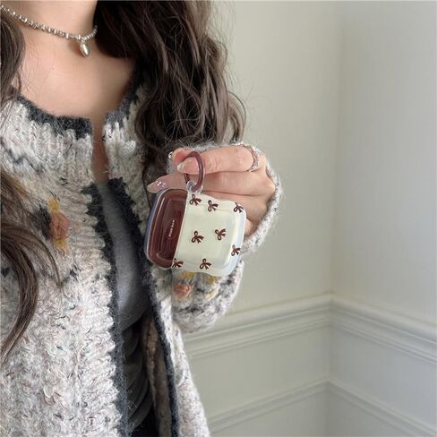 لتصميم القوس الجمالي اللطيف للجيل الرابع من Airpods مع مجموعة سمات الأذن الواقية المتموجة في سلسلة المفاتيح in Kuwait