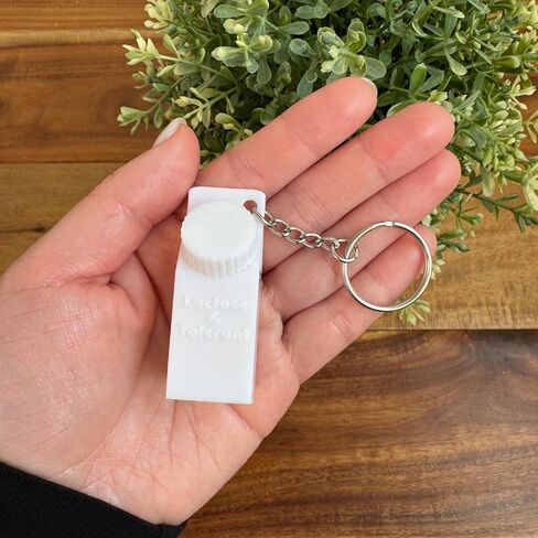 Lactose and Tolerant Pill Holder Milk Carton Keychain backpack purse handbag (Pink) in Kuwait