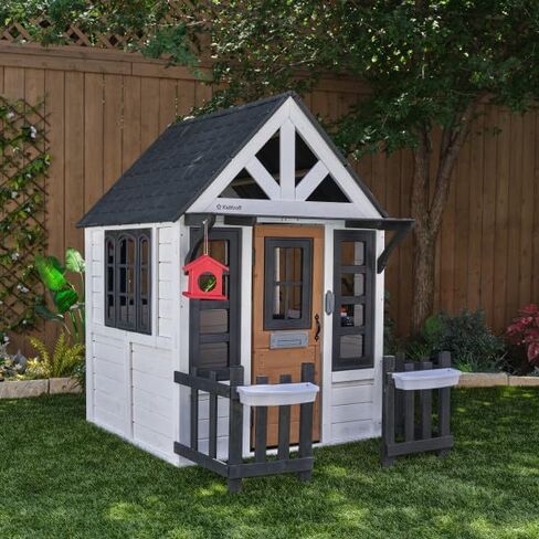KidKraft Riverscape Wooden Playhouse with Working Doorbell, Fence, Kitchen and Pet Door in Kuwait