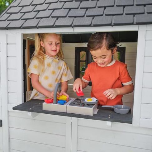 KidKraft Riverscape Wooden Playhouse with Working Doorbell, Fence, Kitchen and Pet Door in Kuwait