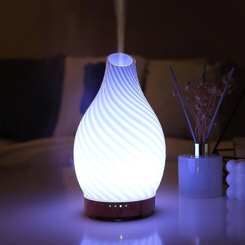 موزع روائح العلاج العطري على شكل جمجمة الهالوين ثلاثي الأبعاد من الزجاج بالموجات فوق الصوتية برائحة الرذاذ البارد ومرطب الزيوت العطرية مع رذاذ متقطع وLED 7 مصابيح ليلية متغيرة ملونة لغرفة النوم والمكتب وديكور المنزل in Kuwait