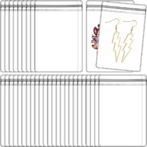 Xindojuz 50 PCS أكياس مجوهرات واضحة ، أكياس قرط البلاستيك PVC مضاد للمجوهرات تخزين حقيبة صغيرة من الرمز البريدي لحلقات المجوهرات والأقراط (شفافة ، 2.76 × 1.97 بوصة)