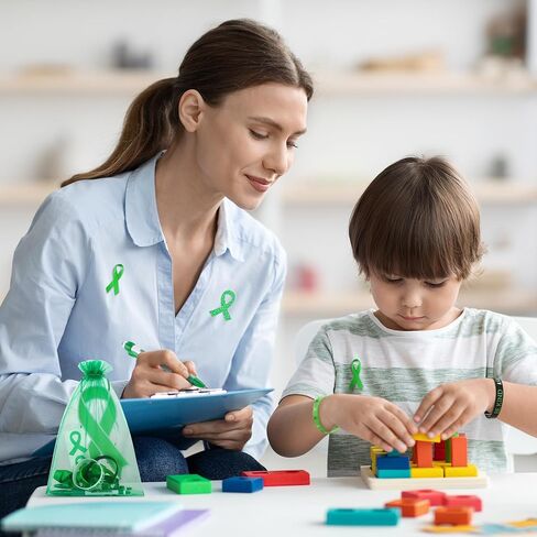 Aodaer 144 Pieces Mental Health Awareness Accessories Set of 24 Green Ribbon Charity Giveaways Favor Pack Include Silicone Bracelets Green Ribbon Pins Pens Button Badge Stickers Organza Bags in Saudi Arabia