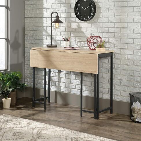 Sauder North Avenue Table with Drop Leaf, L: 47.50" x W: 28.38" x H: 36.13", Charter Oak Finish in Saudi Arabia
