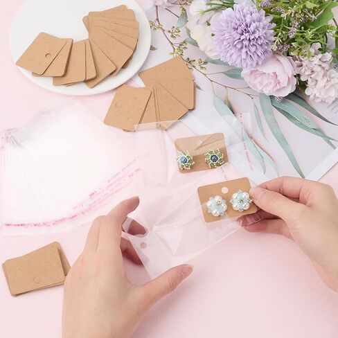 Creatcabin 100pcs حلق بطاقات الحلق مجموعة بطاقات عرض القرط البطاقات kraft الورق علامات kraft علامات فارغة معلقة بطاقة القرط مع حفرة 100pcs أكياس عبوة الورق المقوى لعرض المجوهرات تان 2x1.4inch in Kuwait